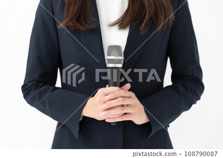 Woman with microphone business hand 108790087