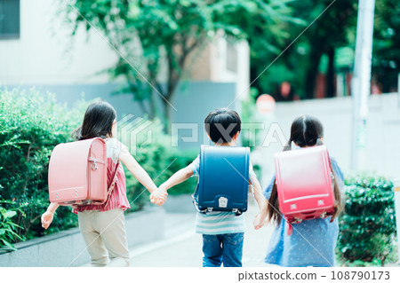 Elementary school students commuting to school. Elementary school students commuting to school. 108790173