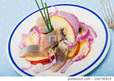 Salad Herring with apples - Norwegian cuisine Salad Herring with apples - Norwegian cuisine 108790929