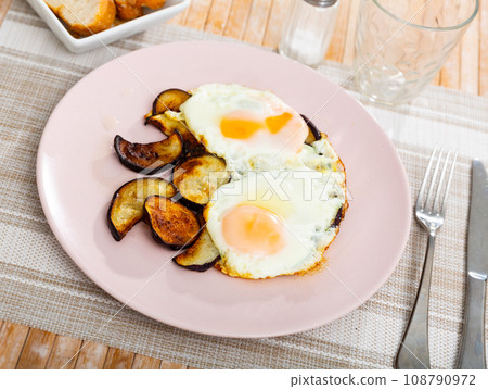 Appetizing fried eggs made with eggplants Appetizing fried eggs made with eggplants 108790972