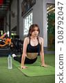 Exercise woman doing yoga stretching poses 108792047