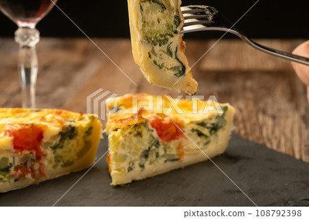 Quiche with chopsticks 108792398