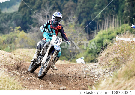 Motocross bike running at speed 108793064