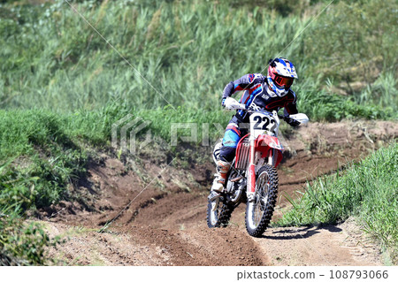 Motocross bike running at speed 108793066