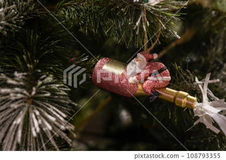 toy pink Santa Claus on Christmas tree, Happy New Year card toy pink Santa Claus on Christmas tree, Happy New Year card 108793355