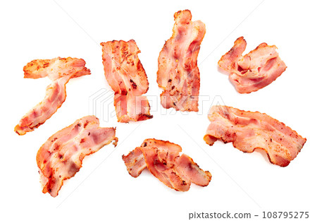 Fried bacon slices isolated on white. 108795275