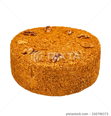 Cake Medovik with prunes, honey cakes and custard isolated on white 108796373