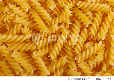Pasta products in the form of a spiral, texture 108799933