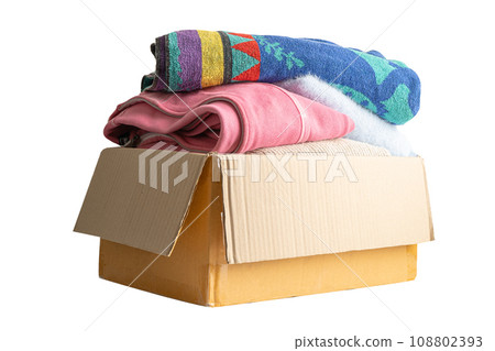 Donation box with used clothes isolated on white background with clipping path to support help for poor people in the world. Donation box with used clothes isolated on white background with clipping path to support help for poor people in the world. 108802393