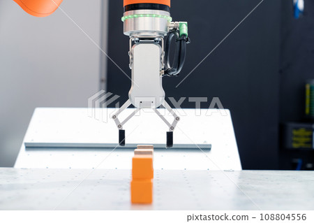 Modern handling robot - robotic arm. Smart factory 108804556