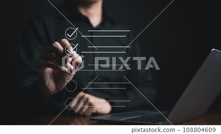 Businessman using pen to tick correct sign mark in checkbox for quality document control checklist and business approve project concept. Check mark, Filling out digital form checklist, Online exam, Businessman using pen to tick correct sign mark in checkbox for quality document control checklist and business approve project concept. Check mark, Filling out digital form checklist, Online exam, 108804609