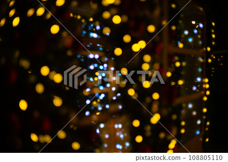 Blurred holiday background with bokeh. Blurred holiday background with bokeh. 108805110