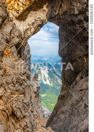 Prisojnik or Prisank Window. The larges rock window in Alps, Triglav National Park, Julian Alps, Slovenia Prisojnik or Prisank Window. The larges rock window in Alps, Triglav National Park, Julian Alps, Slovenia 108806180