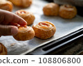 Child's hand taking homemade snack 108806800
