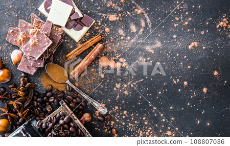 Chocolate, nuts, spices on table Chocolate, nuts, spices on table 108807086