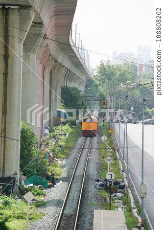 Trains running at SRT Asoke Station, National Railways of Thailand, Bangkok, Kingdom of Thailand 108808202