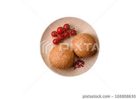 Delicious fresh crispy white round bread with seeds and grains 108808630