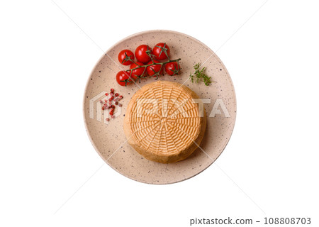Delicious hard craft cheese made from cow or goat milk 108808703