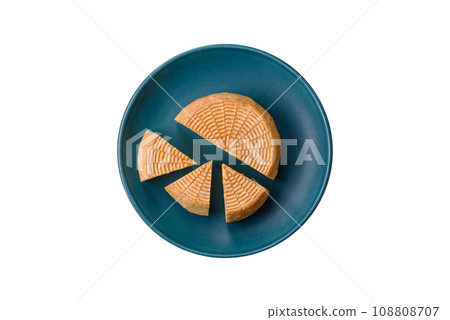Delicious hard craft cheese made from cow or goat milk 108808707