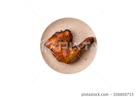 Delicious grilled chicken leg or quarter with salt and spices 108808715