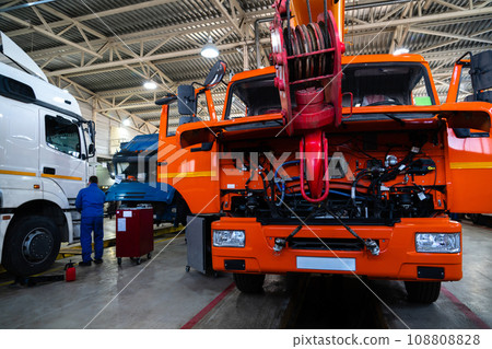 Trucks repair in car service 108808828
