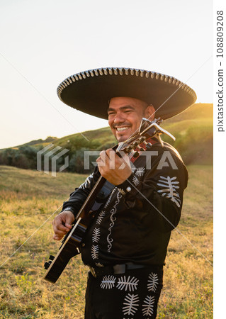 Mexican musicians mariachi with guitar. 108809208