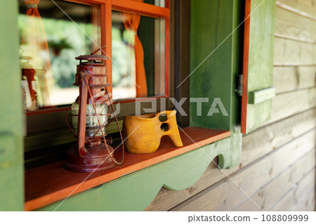 Traditional Finnish wooden mug kuksa and vintage lantern Traditional Finnish wooden mug kuksa and vintage lantern 108809999