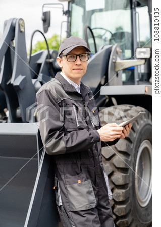 Serviceman with digital tablet 108810435