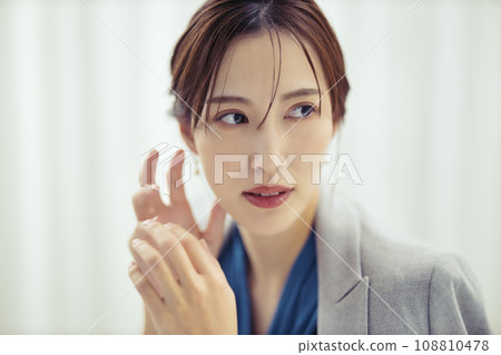 Beauty image of a woman wearing a jacket Beauty image of a woman wearing a jacket 108810478