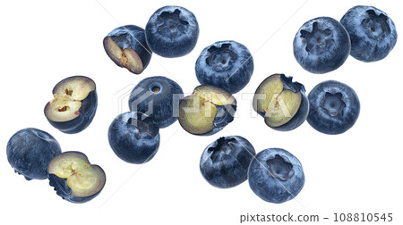 Falling blueberries, bilberry halves isolated on white background 108810545