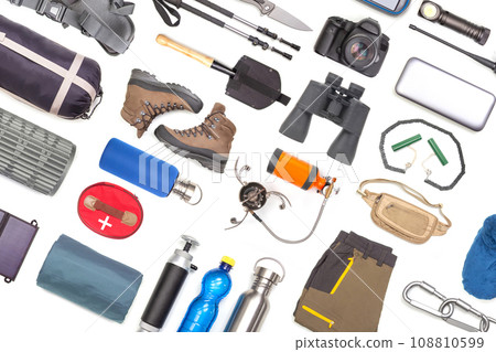 Set of tourist trekking items on white background. Top view of accessories for travel. 108810599