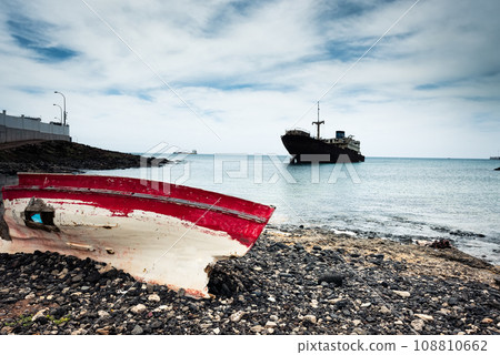 boat and broken ship on Lanzarote 108810662