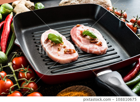 pork in a frying pan pork in a frying pan 108810675