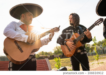 Mexican musician mariachi band on a city street. 108810912
