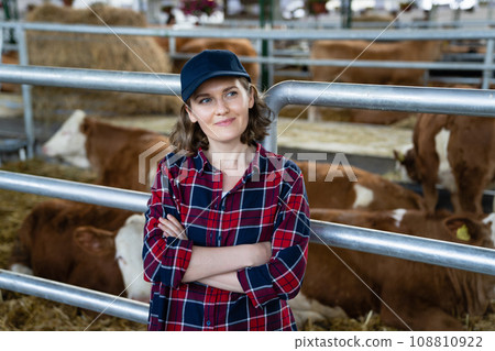 Woman farmer at a farm. Woman farmer at a farm. 108810922