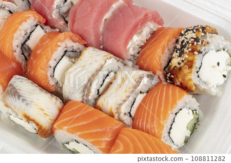 A set of various sushi rolls close-up. A set of various sushi rolls close-up. 108811282