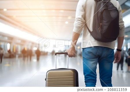 unrecognizable traveler with suitcase on wheels at airport hall, low angle view, neural network generated photorealistic image 108811359