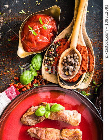 grilled meat with tomato sauce and spices grilled meat with tomato sauce and spices 108812093