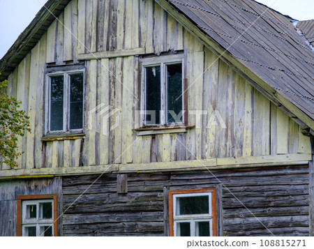 Abandoned old wooden country house in the countryside of Latvia Abandoned old wooden country house in the countryside of Latvia 108815271