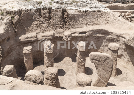 Ancient stone statues in archeological site of Karahan Tepe in Turkey. 108815454