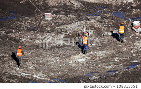 Kiev, Ukraine March 13, 2019: Workers - zero-cycle construction of the foundation of an entertainment center Kiev, Ukraine March 13, 2019: Workers - zero-cycle construction of the foundation of an entertainment center 108815551