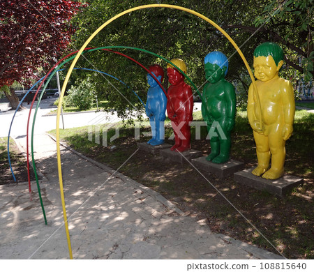 Kiev, Ukraine June 16, 2021: Monument to the peeing boys in the park "Kievan Rus" in the city of Kiev Kiev, Ukraine June 16, 2021: Monument to the peeing boys in the park "Kievan Rus" in the city of Kiev 108815640