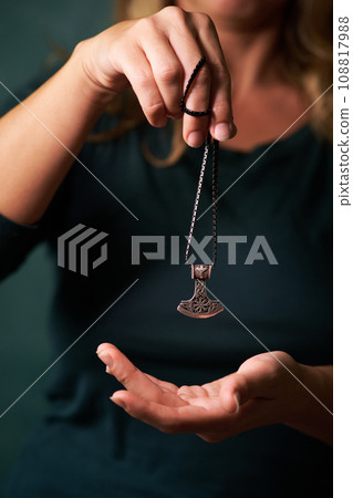silver runic talisman hammer of thor in hand silver runic talisman hammer of thor in hand 108817988