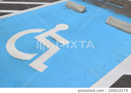 Wheelchair mark caring parking lot 108818179