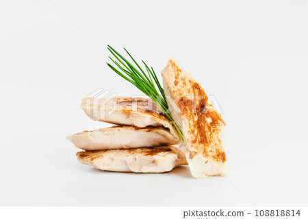 Chicken fillets fried until half cooked, semi-finished product with fresh herbs on a white background. Fast food. Quick cooking at home. Copy space.Fast cooking.Fast homemade food. Chicken fillets fried until half cooked, semi-finished product with fresh herbs on a white background. Fast food. Quick cooking at home. Copy space.Fast cooking.Fast homemade food. 108818814