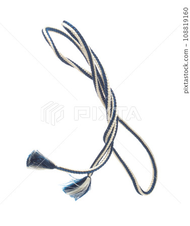 String rope obi Japanese Traditional Komono equipment fly in air with curve. String rope obi Japanese Traditional Komono fabric is beautiful clothes for ceremony event. White background isolated 108819160