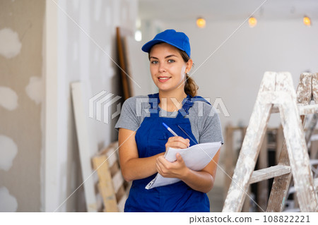 Woman construction worker with project documentation 108822221