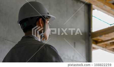 A man wearing a helmet A man wearing a helmet 108822259