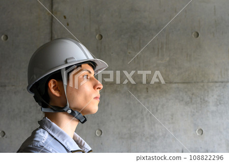 A man wearing a helmet A man wearing a helmet 108822296