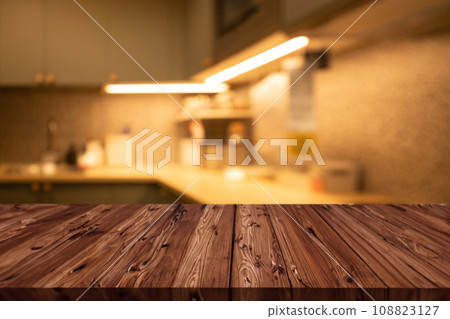 luxury dim light modern home kitchen counter interior with wooden foreground blank space for products advertising montage background 108823127
